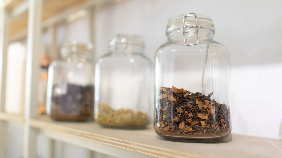 Three glass jars of increasing size on a shelf, representing the three GoHighLevel plans