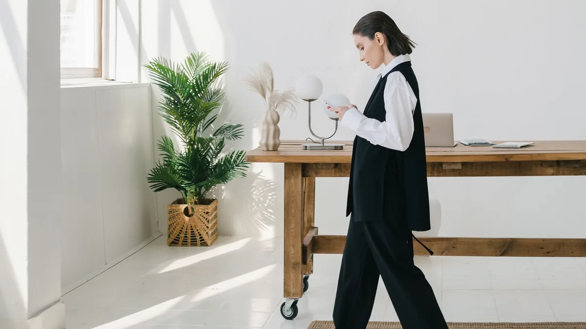 A confident walk through a bright office, representing your next move after spotting a white label CRM